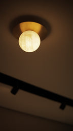 Saturn Cycle Alabaster Wall Sconce